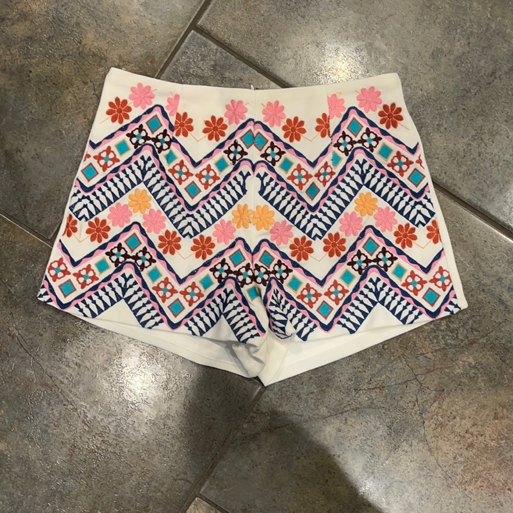 white patterned shorts